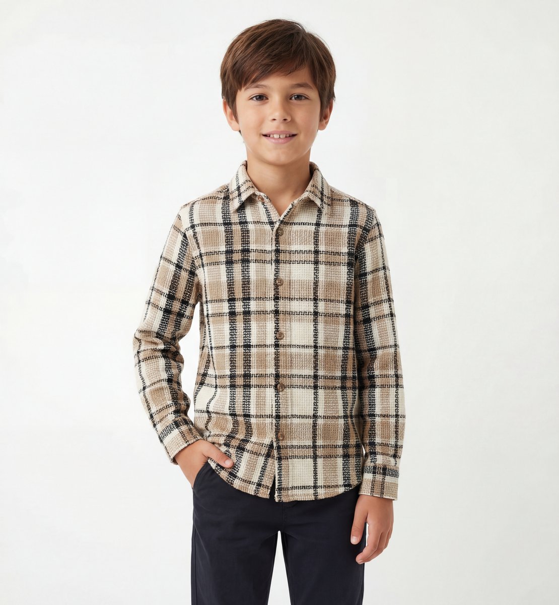 AI-generated kids fashion — boy in brown plaid flannel shirt, studio white background